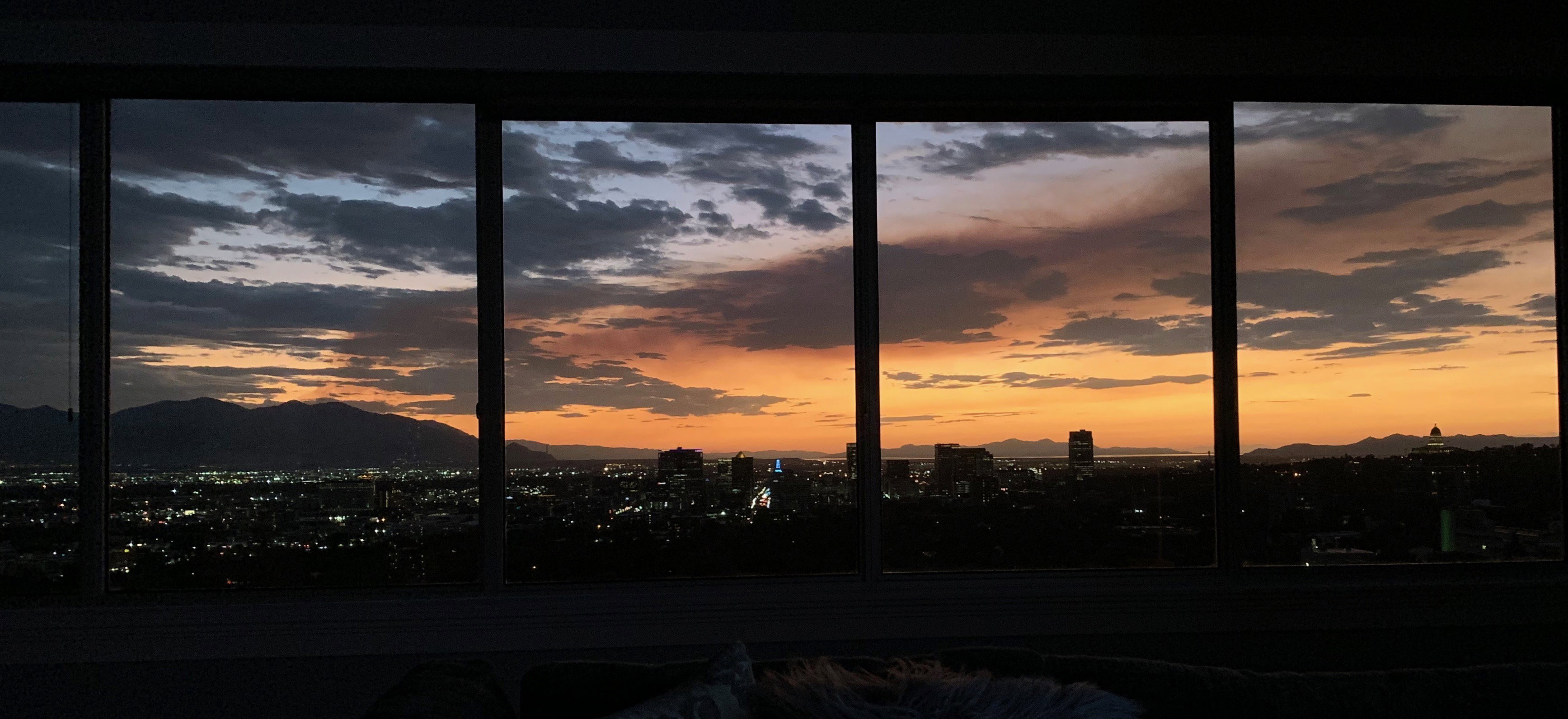 Mountain view featuring nearby urban area