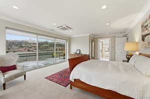Bedroom featuring crown molding, a mountain view, carpet flooring, access to exterior, and recessed lighting