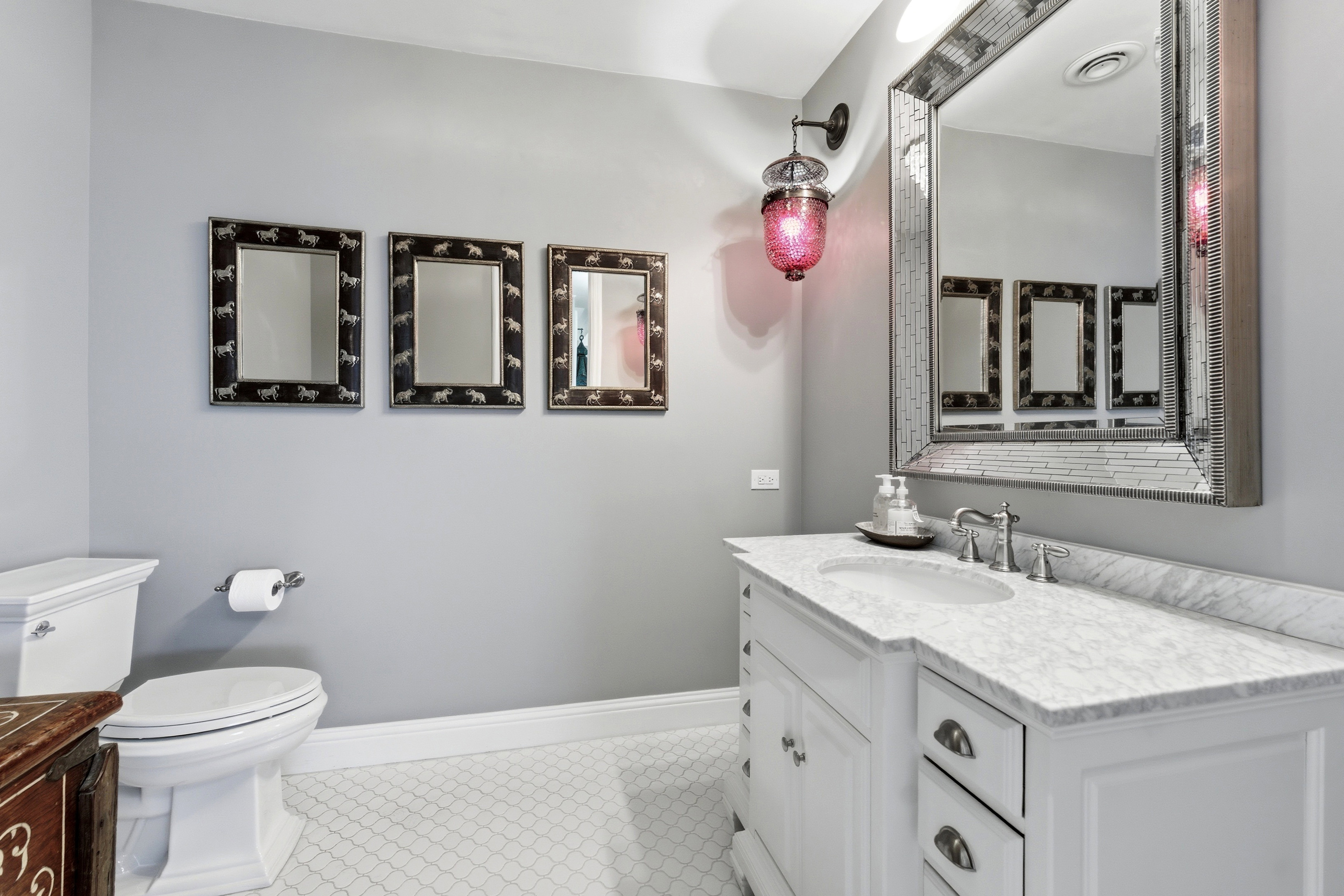 Bathroom with vanity and light tile patterned flooring