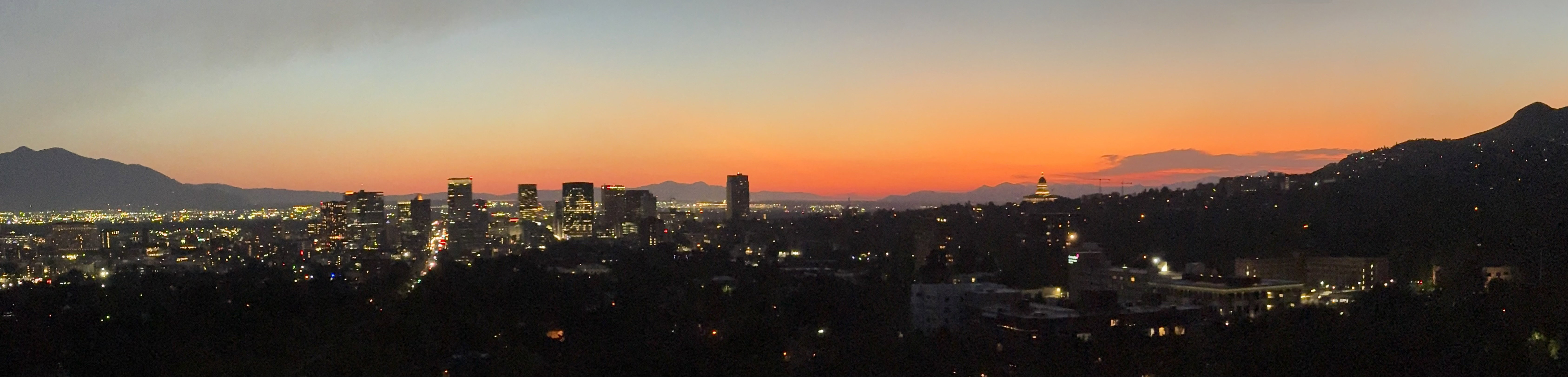 View of mountain backdrop with nearby urban area