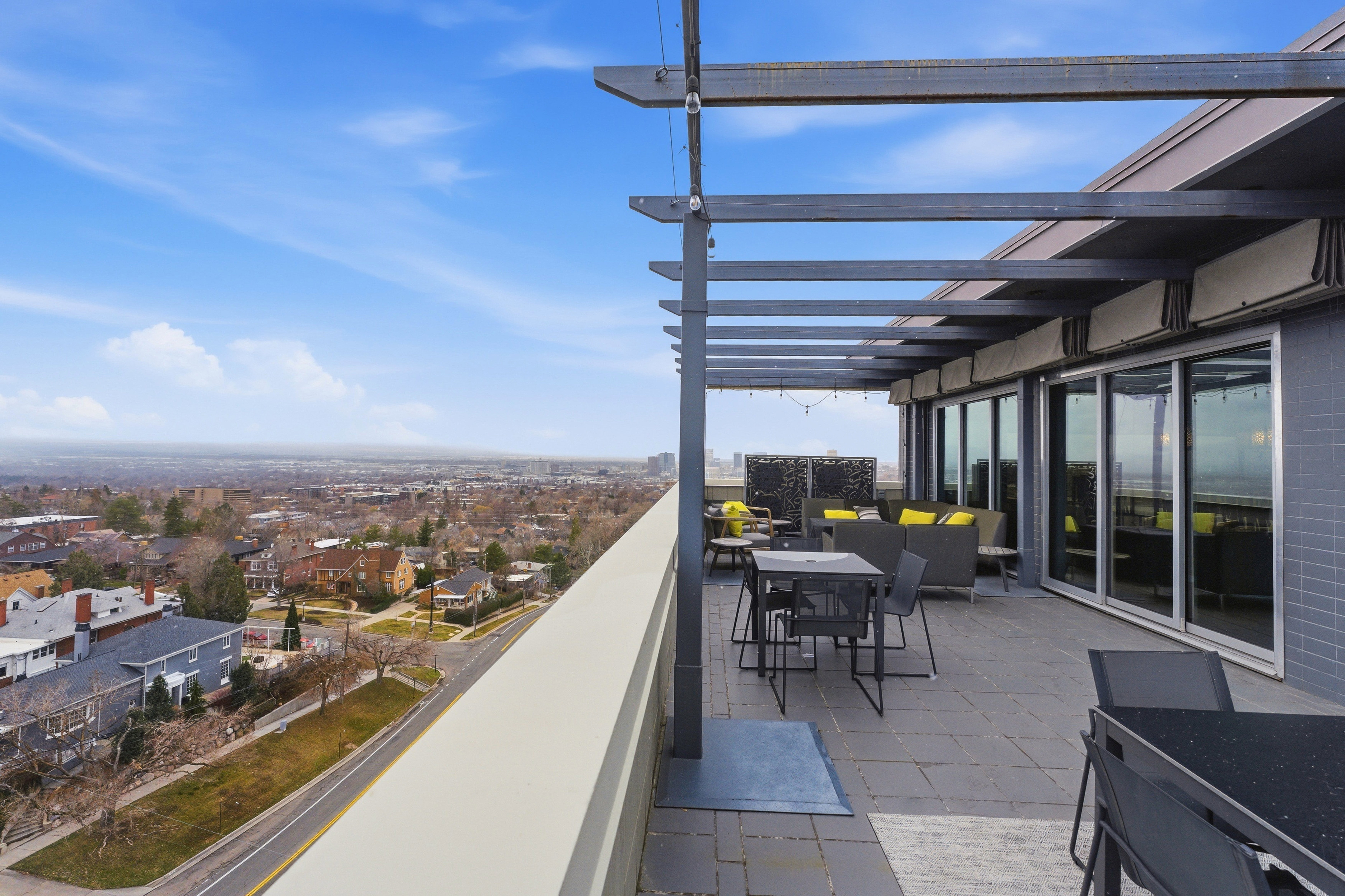 Balcony with an outdoor living / dining area