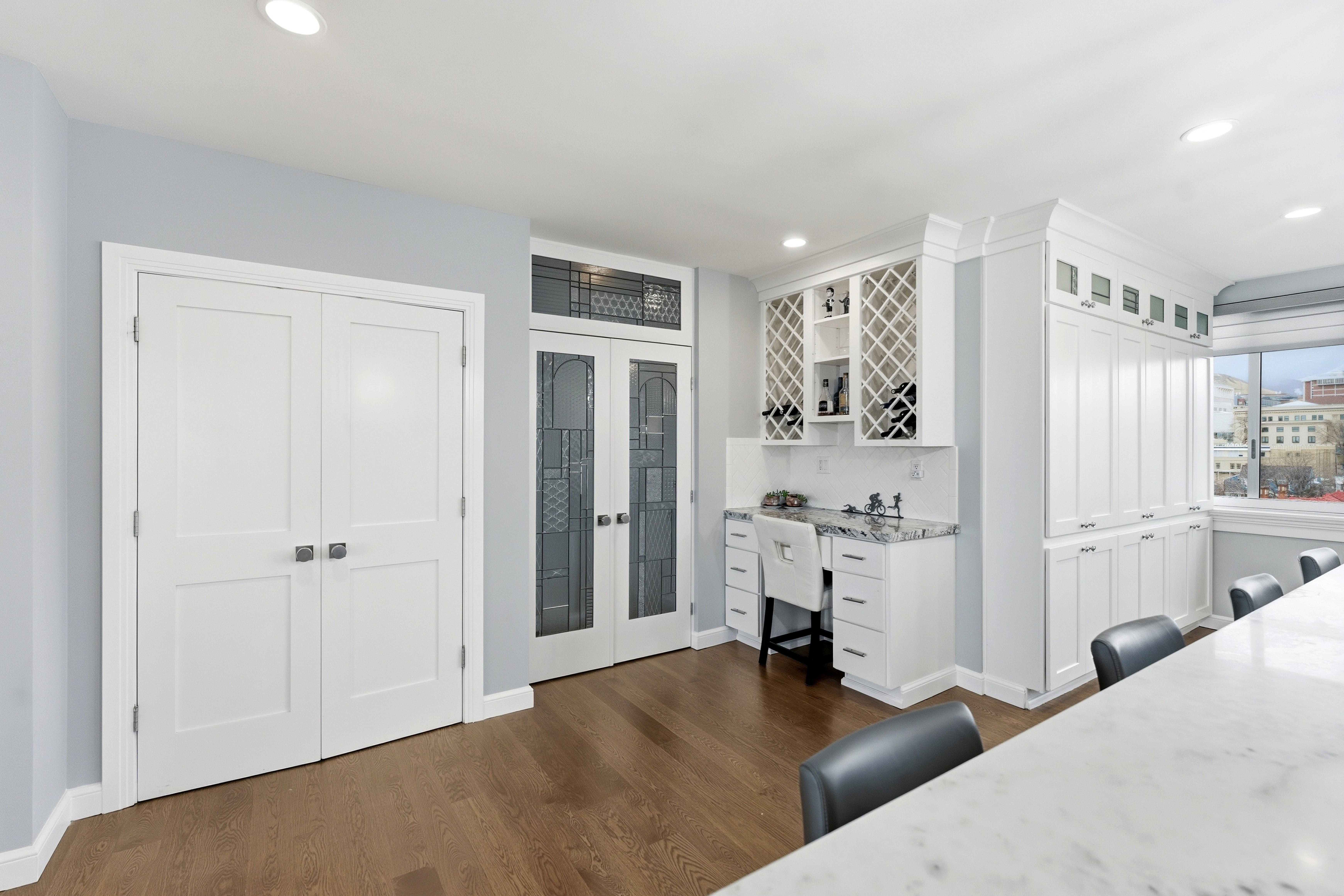 Office featuring dark wood-style flooring, french doors, and recessed lighting