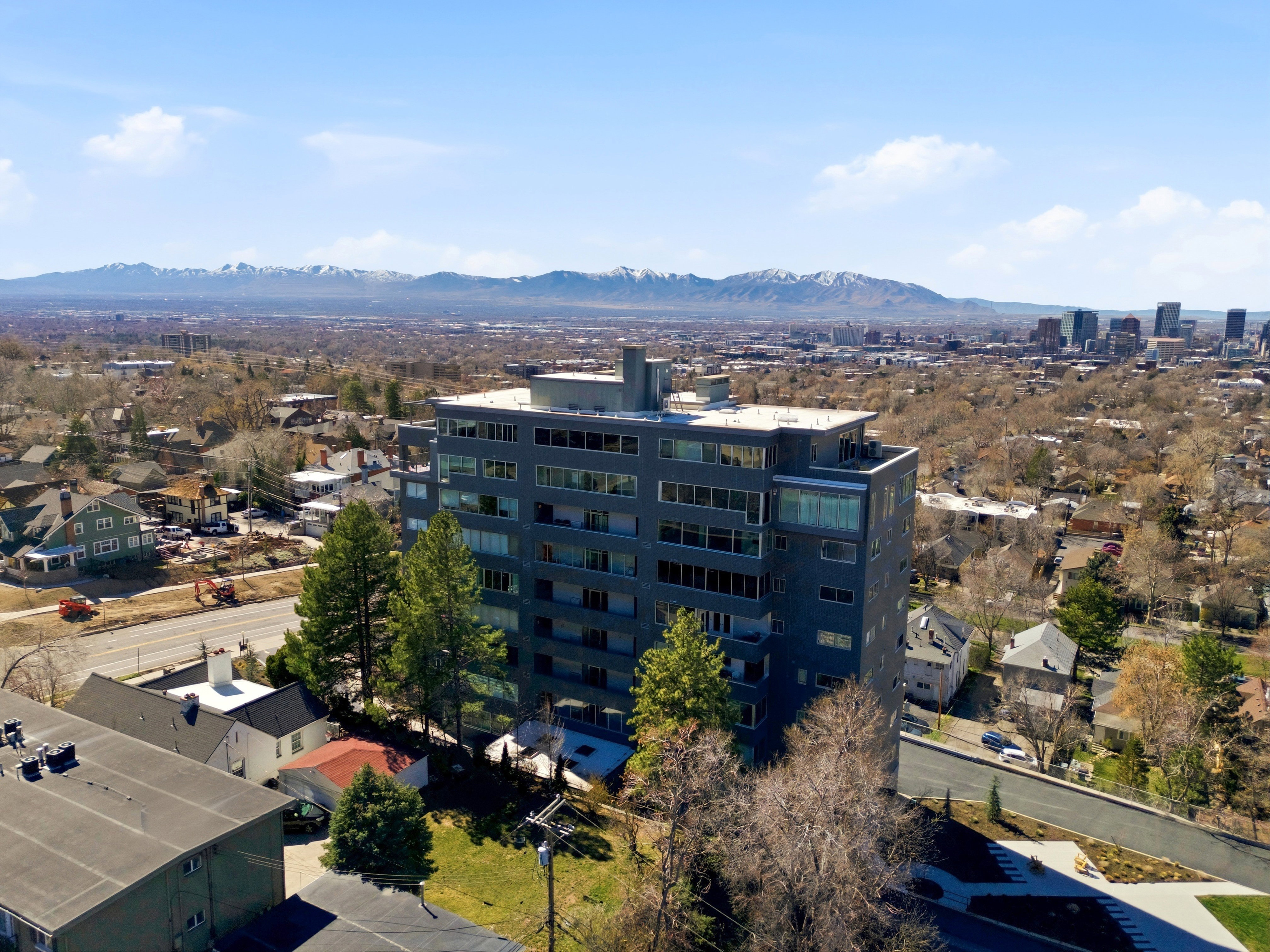 Aerial view of residential area with mountains