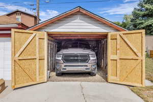 View of parking with a gate