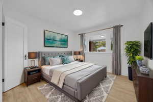 Bedroom with light wood-type flooring