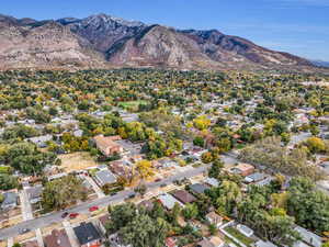 Aerial view of residential area with a mountainous background