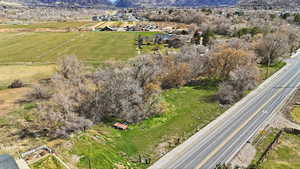 Aerial view of sparsely populated area with a mountain backdrop