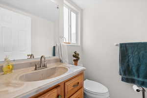 Bathroom with vanity and toilet