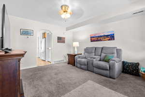 Living Room – Alternate View – Spacious layout with an open flow toward the adjoining areas of the home, creating a versatile space for everyday living and entertainment.