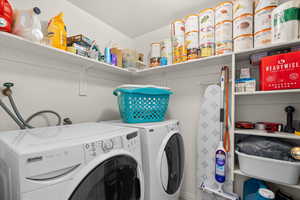Laundry room featuring washer and dryer