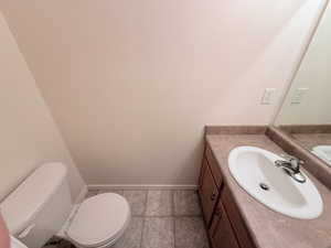 Bathroom featuring vanity and toilet