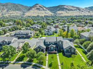 Aerial perspective of suburban area with a mountain backdrop