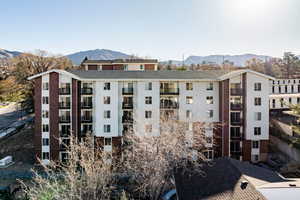 View of apartment building / complex with a mountain view