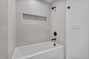 Full bath featuring  shower combination