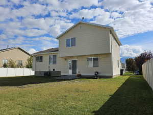 Back of property featuring a patio area