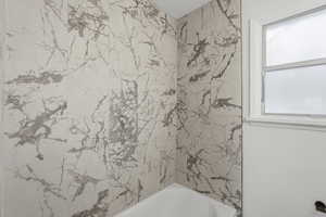 Full bathroom featuring  shower combination