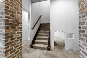 Stairs featuring carpet