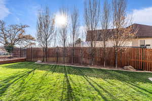 View of fenced backyard