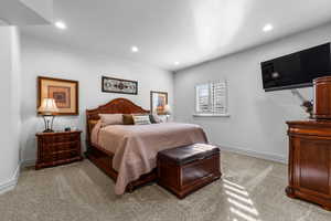 Bedroom featuring carpet flooring and recessed lighting
