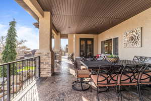 View of patio with outdoor dining area