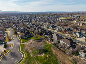 Aerial view of residential area with a mountainous background