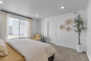 Bedroom with carpet flooring and recessed lighting