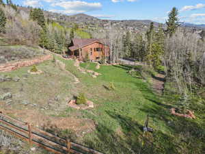 View from above of property featuring a mountain backdrop