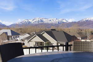 View of mountain backdrop with nearby suburban area