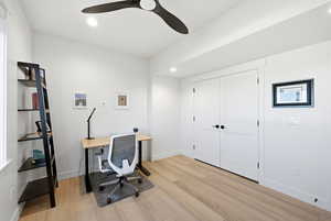 Office featuring ceiling fan, light wood-type flooring, and recessed lighting
