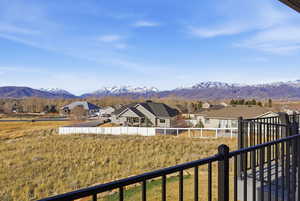 View of mountain backdrop with nearby suburban area