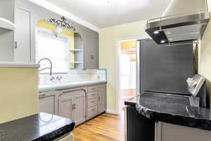 A kitchen featuring a sunny disposition. Colors may be updated in person.