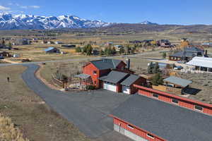 Aerial perspective of suburban area with a mountain backdrop