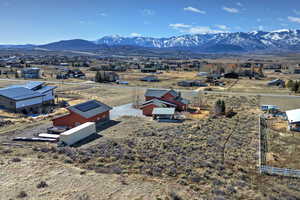 Aerial perspective of suburban area featuring mountains