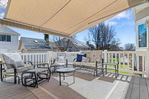 Deck with an outdoor living space