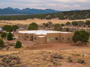 View of mountain backdrop featuring rural landscape