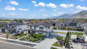 Aerial view of residential area with a mountainous background