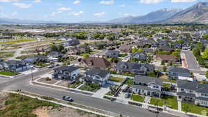 Aerial perspective of suburban area with a mountain backdrop
