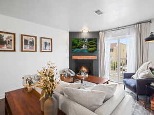 Living area featuring a fireplace