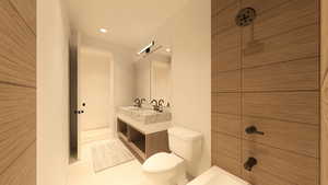 Bathroom with double vanity, recessed lighting, and bathtub / shower combination