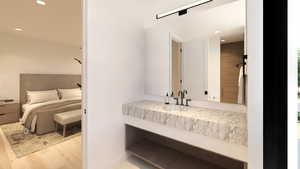 Full bathroom featuring vanity, light wood-style floors, and recessed lighting