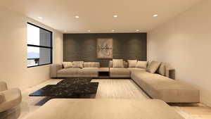 Living area with recessed lighting and baseboards