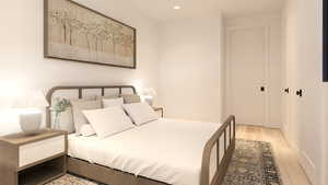 Bedroom with recessed lighting and light wood-type flooring