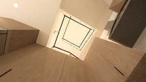 Laundry room featuring cooling unit and light wood-style flooring