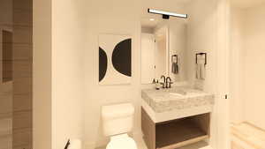 Half bathroom with toilet and vanity