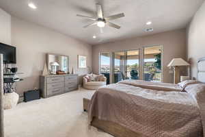 Bedroom with carpet, ceiling fan, and recessed lighting