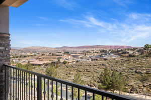 Balcony with a mountain view and a residential view