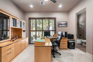 Home office with light colored carpet, a ceiling fan, and recessed lighting