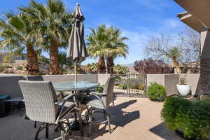 View of patio with outdoor dining area