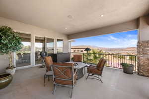 View of patio featuring a mountain view
