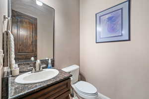 Bathroom with vanity and toilet